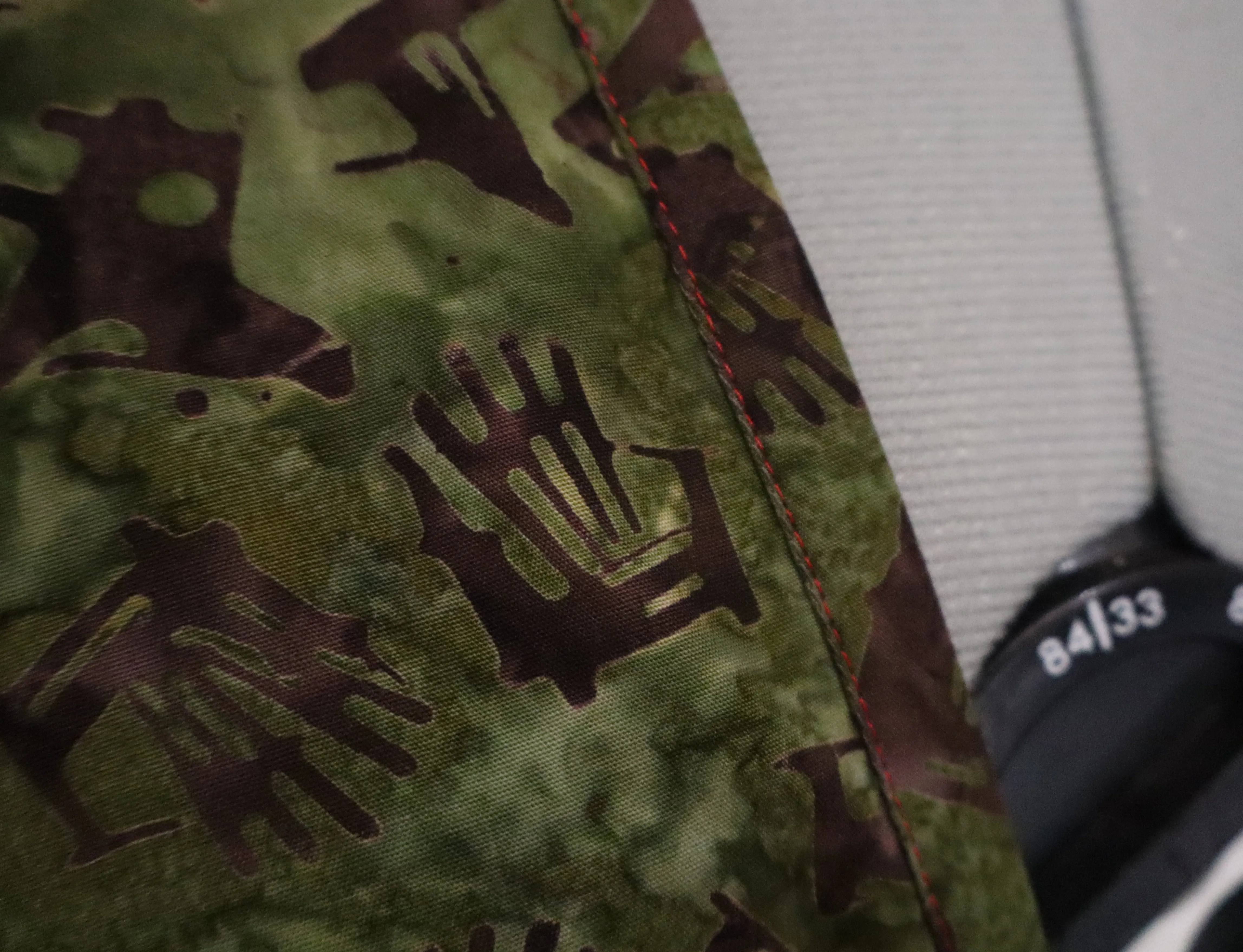 Close-up of the pattern on the Coat of the Cricket's Song