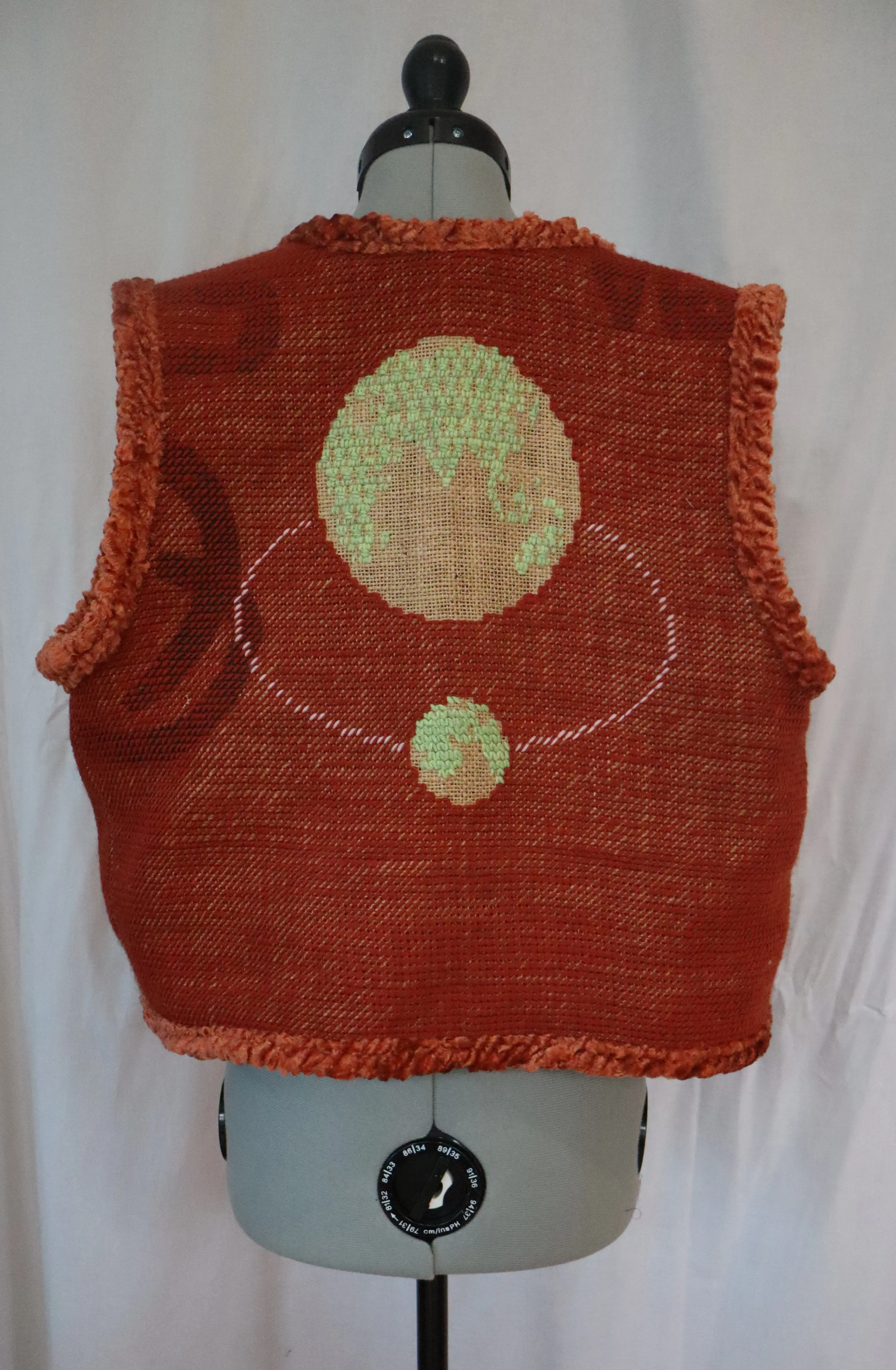 Back of the Orbital Mechanic's Vest