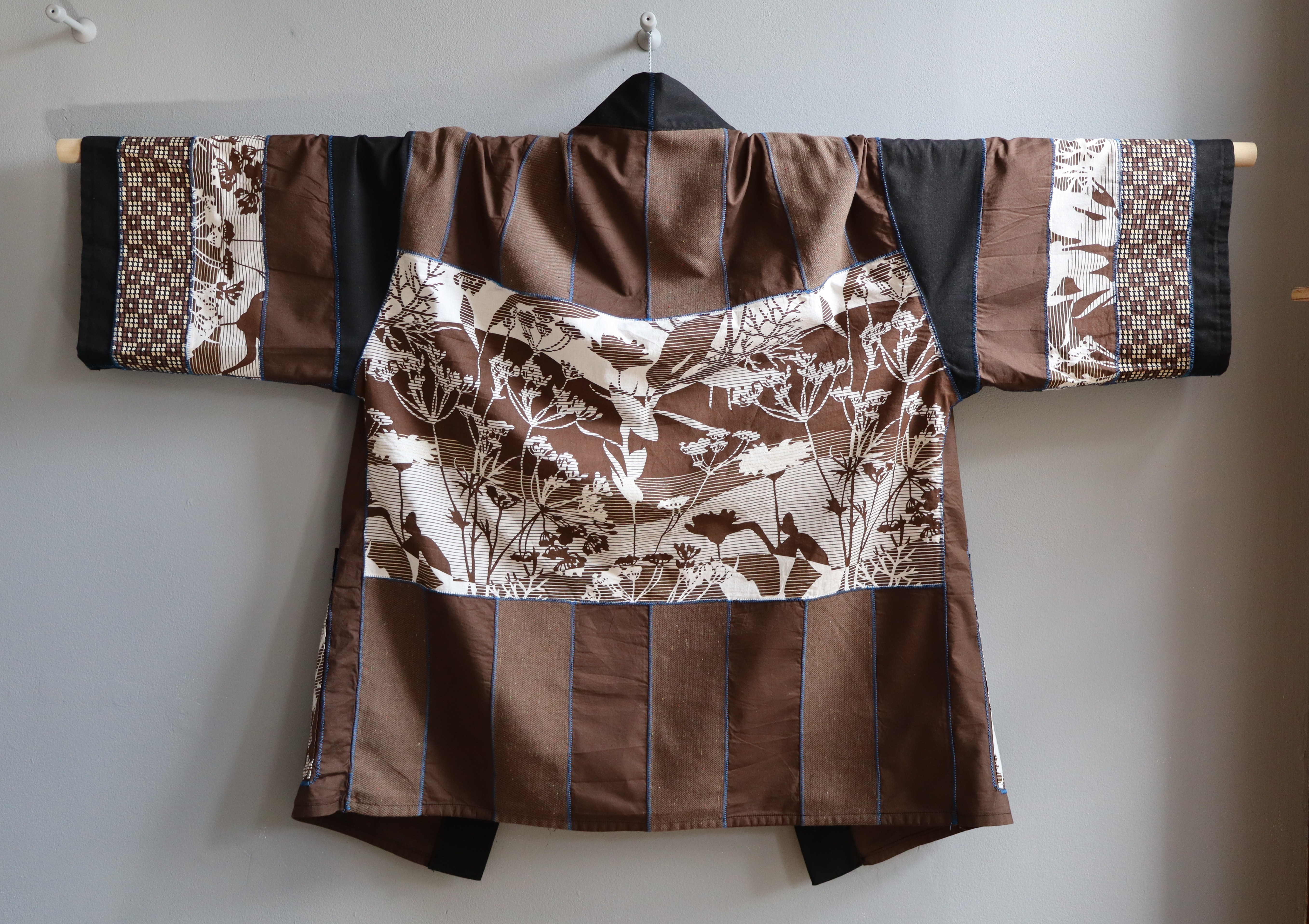 Back of the Robe of the Earth's Flourishing in Space, hanging open to show the patchwork